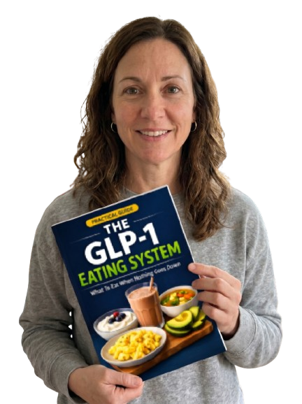 Woman holding The GLP-1 Eating System guide